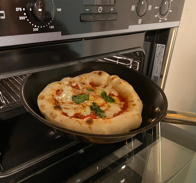 cooking pizza in oven