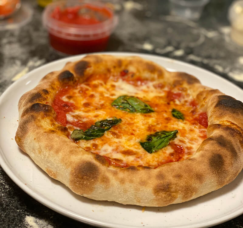 cooked pizza on a plate